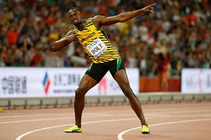 Vượt Gatlin ngoạn mục, ‘tia chớp’ Bolt vô địch thế giới 100m