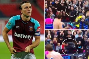 CĐV trả giá vì giành áo đấu với hai đứa trẻ