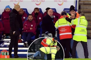 Pep Guardiola bị fan cuồng lao vào sân tấn công 