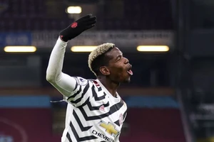 Pogba đang hạnh phúc ở MU. ẢNH: REUTERS