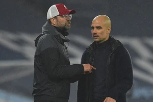 Pep Guardiola đáp trả lời chỉ trích Man City của Klopp. ẢNH: GETTY