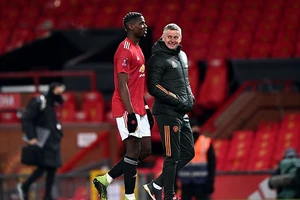 Solskjaer có mối quan hệ rất tốt với Pogba. ẢNH: PA
