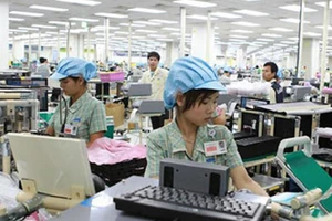 Tìm cách bảo vệ lao động Việt Nam tại Malaysia