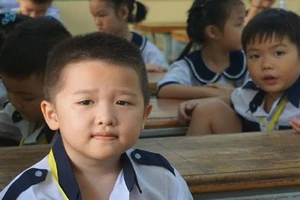Học sinh trường Tiểu học Trần Quốc Thảo, quận 3 trong ngày tựu trường. Ảnh: NQ