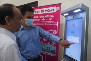 TP.HCM phấn đấu 100% trường học thanh toán không dùng tiền mặt