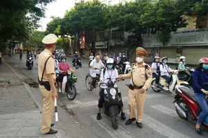 Đi xe máy điện cũng phải mua bảo hiểm 