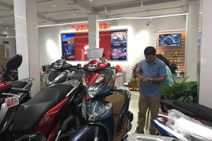 Lượng xe máy Honda bán ra ngày càng giảm. Ảnh: THY NHUNG