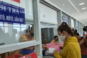 Lý giải việc thay đổi lệ phí đăng ký biển số xe, đăng ký xe ô tô sau sáp nhập