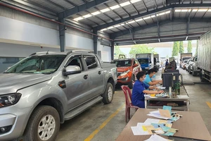 Cơ sở đăng kiểm phải cấp giấy và tem kiểm định trong 4 giờ làm việc 