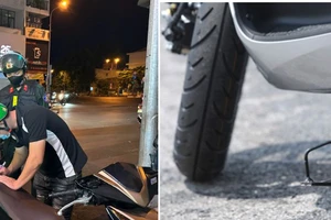 Đi xe máy nếu để chân chống quệt xuống đường coi chừng bị phạt nặng