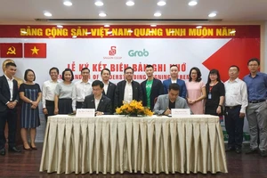  Đại gia bán lẻ bắt tay Grab giao nhận thức ăn