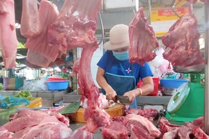  Giá thịt heo tại chợ giảm 5.000 đồng/kg