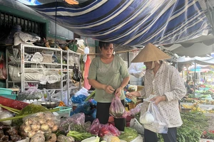 Trong tháng 3 giá lương thực phẩm giảm ẢNH: TÚ UYÊN