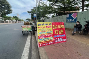 Cử tri TP.HCM kiến nghị mua bảo hiểm xe máy là hình thức tự nguyện