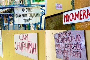 Hẻm ở TP.HCM treo bảng cấm chụp hình, giới trẻ vẫn mặc kệ