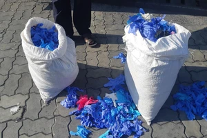 Điều tra lô găng tay Trung Quốc đã sử dụng nhập cảng Cát Lái