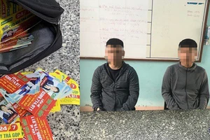 Phát tờ rơi cho vay, 2 nam thanh niên bị xử phạt 