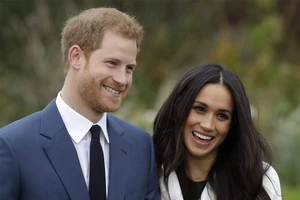 Hoàng tử Harry và vợ là Công nương Meghan. Ảnh: THE ECONOMIST