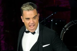 Robbie Williams tạm “nghỉ chơi” Take That