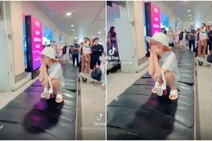 Xác minh, xử lý nghiêm nữ hành khách tạo dáng trên băng chuyền hành lý