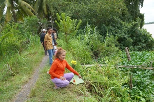 Tìm thấy thi thể nam thanh niên bị mất tích dưới sông Hàm Luông