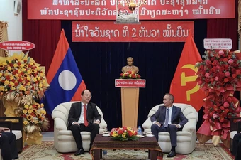 Phó Bí thư Thường trực Nguyễn Hồ Hải thăm, chúc mừng 49 năm Quốc khánh Lào