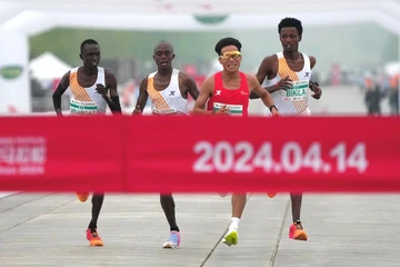 Các vận động viên tham gia Giải bán marathon Bắc Kinh 2024. Ảnh: CNSPHOTO/REUTERS
