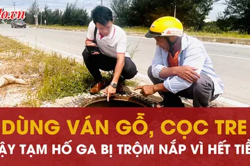 Quảng Trị: Dùng ván gỗ, cọc tre đậy tạm hố ga bị trộm nắp vì…hết tiền