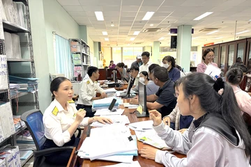 Báo Pháp Luật TP.HCM tổ chức tọa đàm 'Cầm tay chỉ việc hộ kinh doanh tuân thủ pháp luật về thuế'