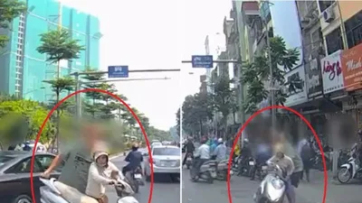 Nghe điện thoại giữa phố, người phụ nữ bị ông Tây 'xử'