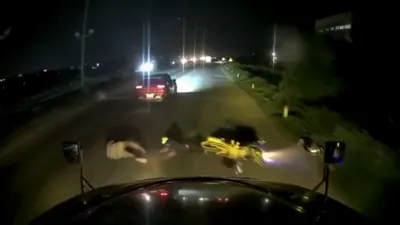 Xác minh clip ô tô vượt lên, va chạm làm 2 người đi xe máy ngã dưới bánh container