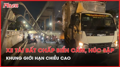Xe tải kéo sập khung giới hạn chiều cao, nhiều người đi đường hú vía