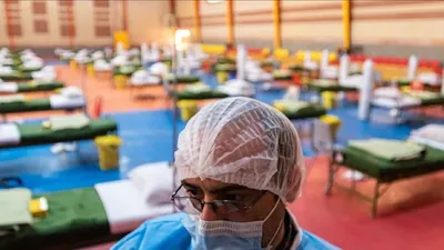 Nhân viên y tế Iran tại một khu cách ly tập trung ở thủ đô Tehran ngày 2-4. Ảnh: AFP