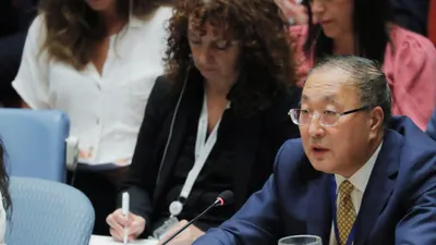 Đại sứ Trung Quốc tại Liên Hiệp Quốc Zhang Jun (phải) vừa lên tiếng chuyện WHO tuyên bố tình trạng khẩn cấp y tế toàn cầu dịch virus Corona. Ảnh: REUTERS