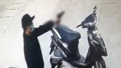 Video: Truy bắt kẻ dùng súng cướp tiền của khách trong ngân hàng ở Đồng Nai