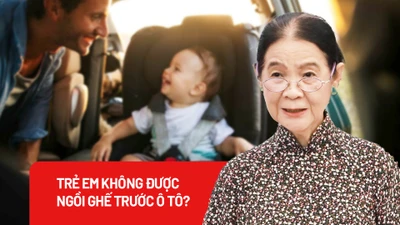 Trẻ em không được ngồi ghế trước ô tô?