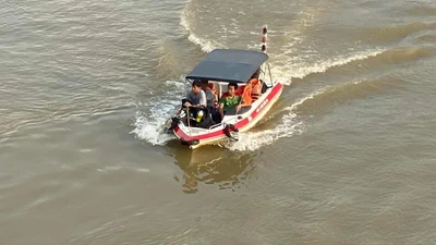 1 phụ nữ bỏ xe máy trên cầu Đồng Nai rồi nhảy xuống sông