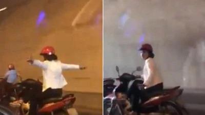 Nữ tài xế 'hồn nhiên', vừa lái xe... vừa dang tay ra múa