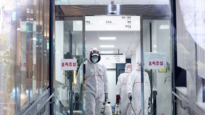 Hàn Quốc đã có ca tử vong thứ 10 và gần 1.000 ca nhiễm COVID-19. Ảnh: YONHAP