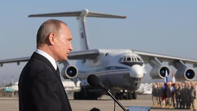 Tổng thống Putin thăm Syria, lệnh rút quân về nước