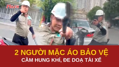 Clip 2 người đàn ông mặc áo bảo vệ, cầm hung khí đe doạ tài xế 