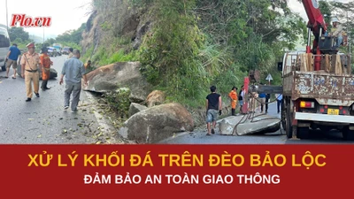 CSGT xử lý khối đá nằm chênh vênh trên đèo Bảo Lộc, ngăn nguy cơ rơi xuống Quốc lộ 20