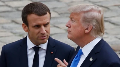 Gặp Tổng thống Pháp, ông Trump tranh thủ bênh con