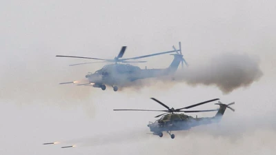 Trực thăng Nga tập trận, bắn nhầm nhà báo?