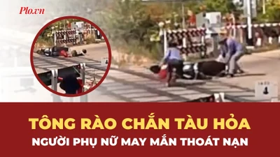 Người phụ nữ tông rào chắn tàu hỏa, may mắn thoát chết trong gang tấc