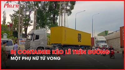 Video: Bị container kéo lê trên đường, một phụ nữ tử vong 