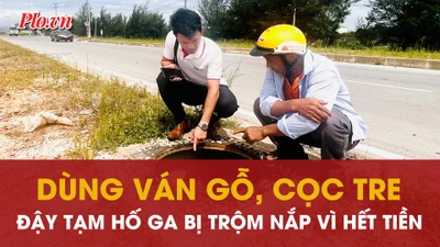 Quảng Trị: Dùng ván gỗ, cọc tre đậy tạm hố ga bị trộm nắp vì…hết tiền