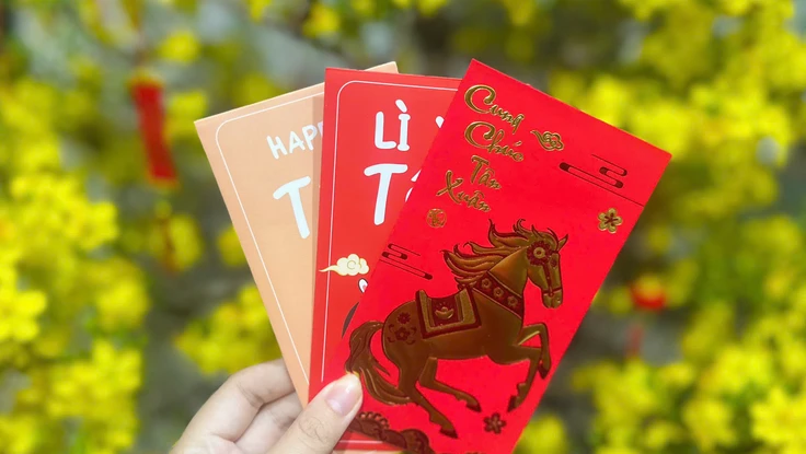 Cha mẹ quản lý tiền lì xì của con và quy định pháp luật