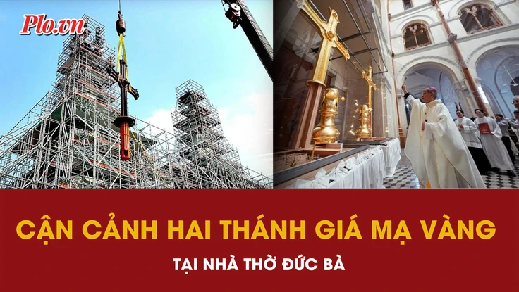 Đưa hai thánh giá mạ vàng lên đỉnh tháp kẽm Nhà thờ Đức Bà