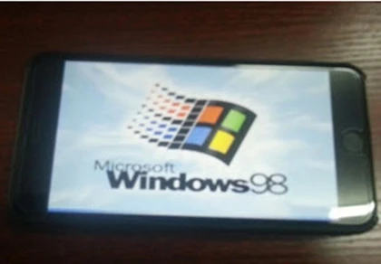 Hacker Trung Quốc hack iPhone 6 Plus chạy Windows 98